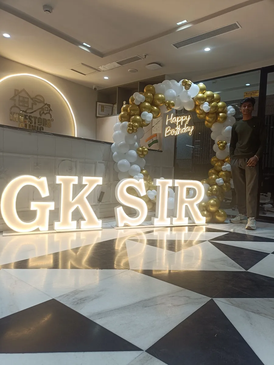 Retirement celebration LED letter display with balloon decoration, Gurugram