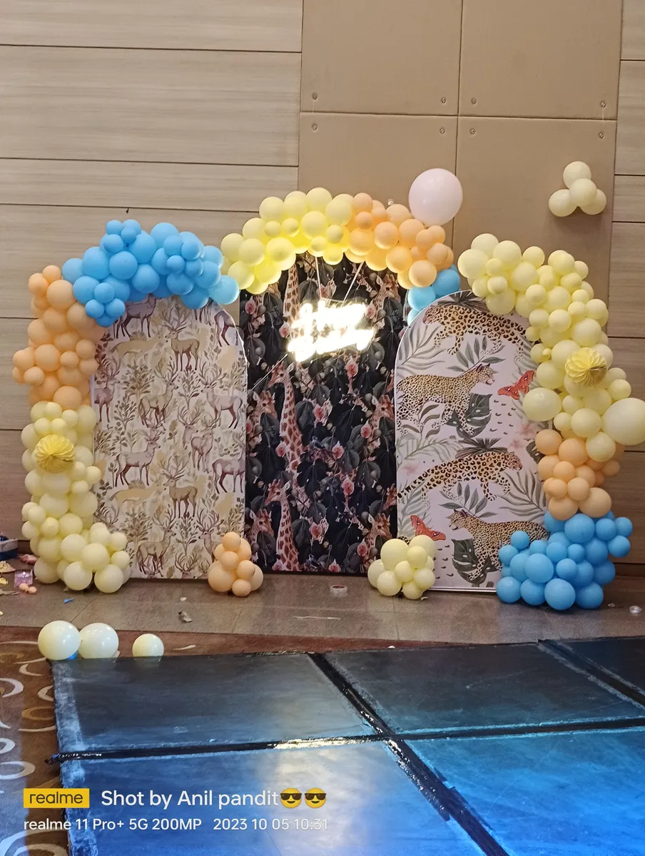 Blue and gold first birthday decoration with wooden panel backdrop, Gurugram