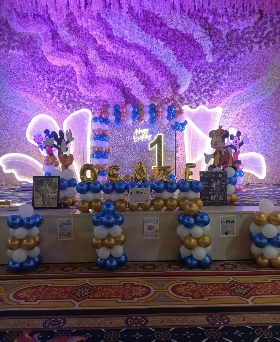Stitch theme birthday decoration with neon light and dessert table, Gurugram